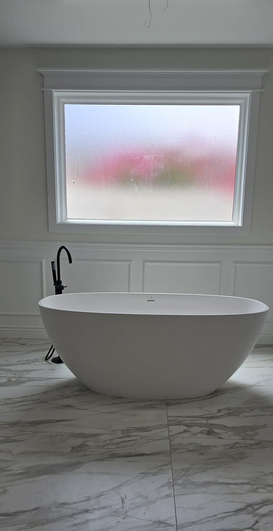 Real photo of completed primary bathroom